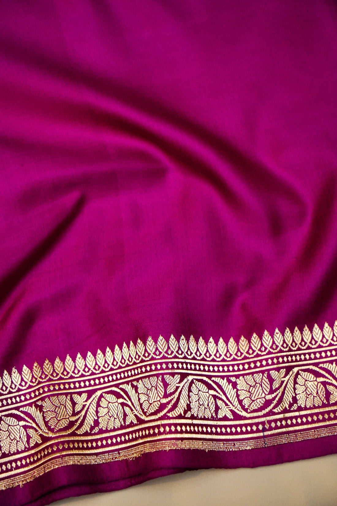 Draped pleats view highlighting comfort and drape of pink Mashru silk saree
